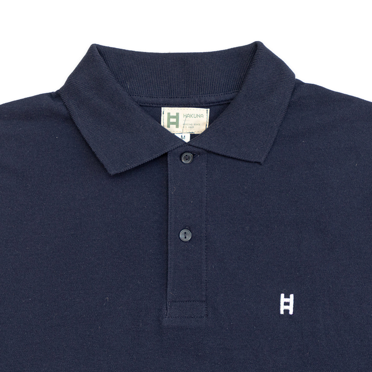 Polo manga corta H bordada